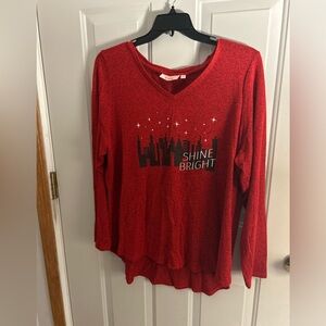 Evri Sz 1X red sweater with a city skyline and stars